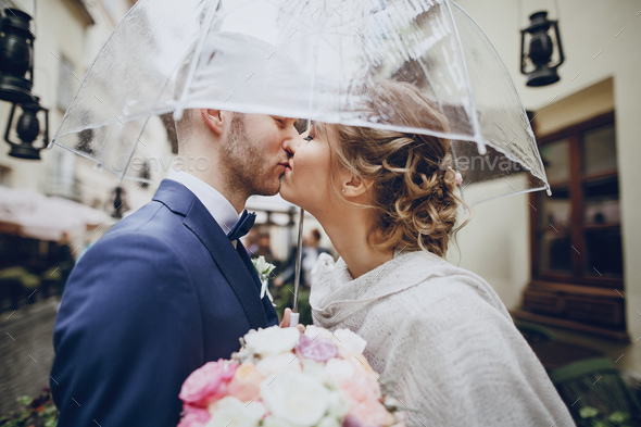 groom and bride in a hotel - Stock Photo - Images