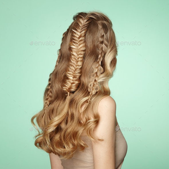 Blonde girl with long and shiny curly hair - Stock Photo - Images