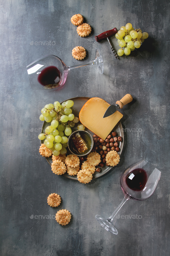Cheese and grapes appetizer - Stock Photo - Images