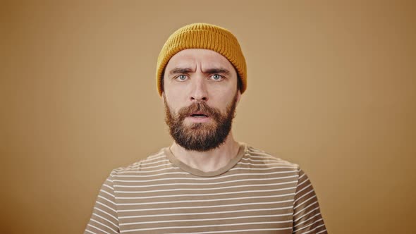 Mature Lumberjack Tries to Calm Down and Smiles Closeup alt