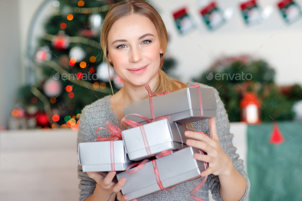 Pretty girl with gifts - Stock Photo - Images