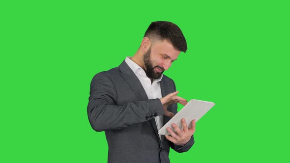 Turk Business Man Beard Standing Using Tablet Computer Green Screen Chroma Key alt