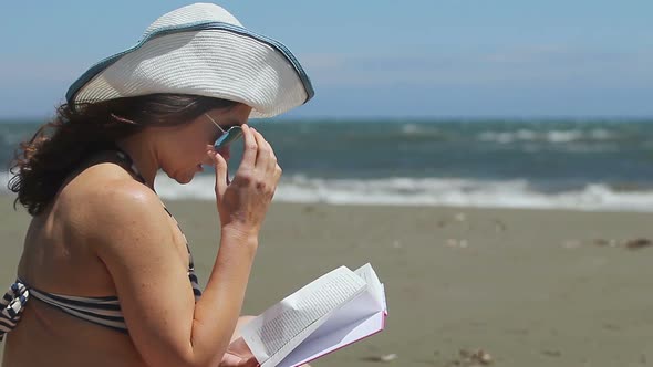 Brunette Female Reading Book, Enjoying Hobby on Summer Vacation, Storm at Sea alt