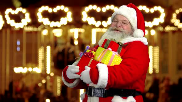 Santa Claus Holding Presents alt