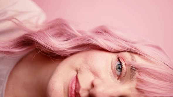 Closeup of Human Female Face with Pink Hair