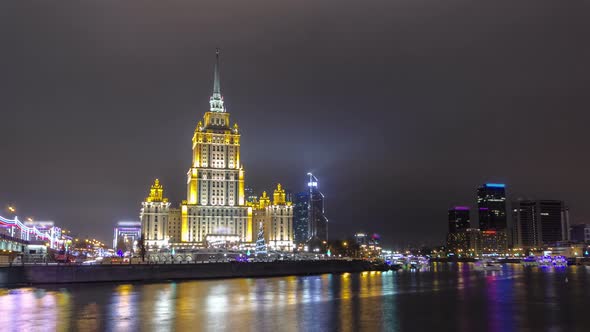 Hotel Ukraine Winter Night Timelapse Hyperlapse with Bridge Over Moscow River alt