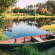 Old Wooden Rowing Fishing Boat Near Lake River Coast At Beautifu Stock  Photo by Great_bru