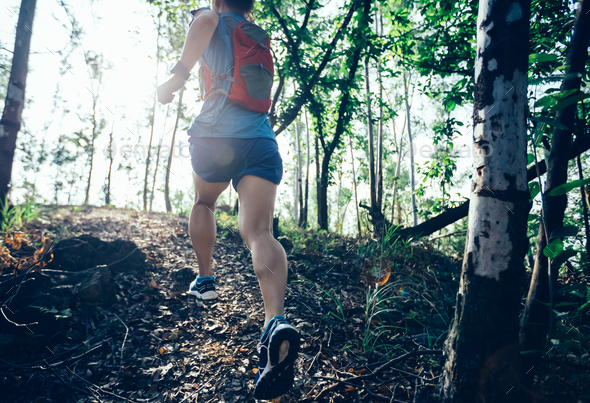 Running in forest Stock Photo by lzf | PhotoDune