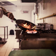 Chef doing flambe on food - PhotoDune Item for Sale