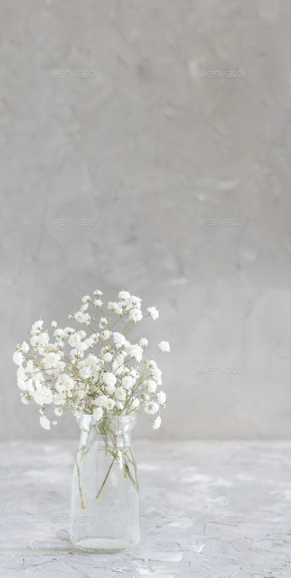 Bouquet of small white flowers and wooden hearts Stock Photo by katrinshine