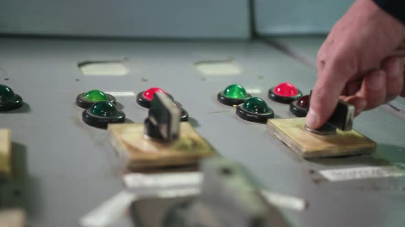 Engineer Wearing an Orange Protective Mask Finger Press Button Controling Cnc alt