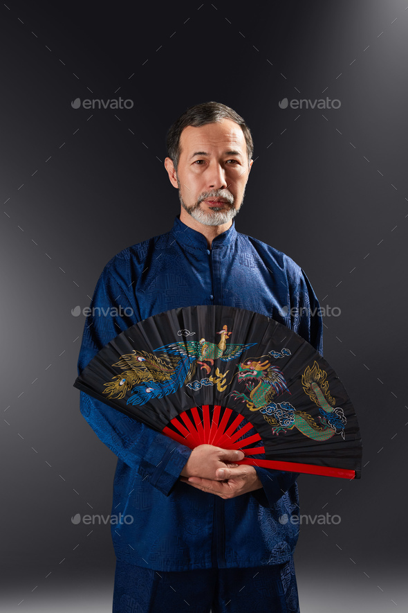 Senior master practicing qi qong taijiquan - Stock Photo - Images