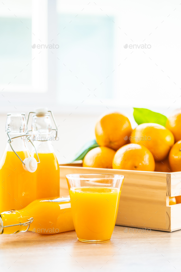 Fresh orange juice for drink in bottle glass Stock Photo by siraphol