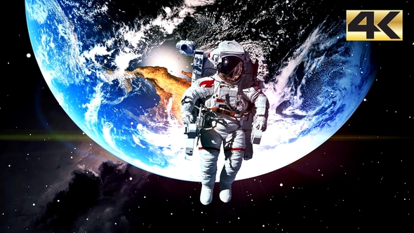 Astronaut In Outer Space Against The Planet Earth