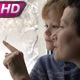 Family Admiring Christmas Snowfall - VideoHive Item for Sale