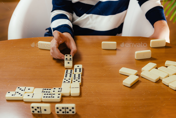 Boy Playing Dominoes Stock Photo By Microgen Photodune