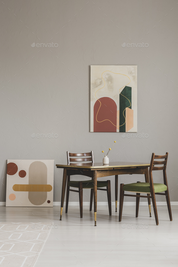 Abstract Paintings On Grey Wall Of Retro Dining Room Interior Stock Abstract Paintings On Grey Wall Of Retro Dining Room Interior Stock Photo Images