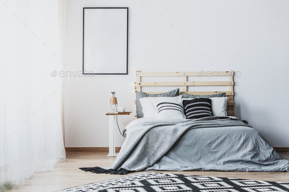 Download Mockup Of Empty Poster In White Bedroom Interior With Grey Woode Stock Photo By Bialasiewicz