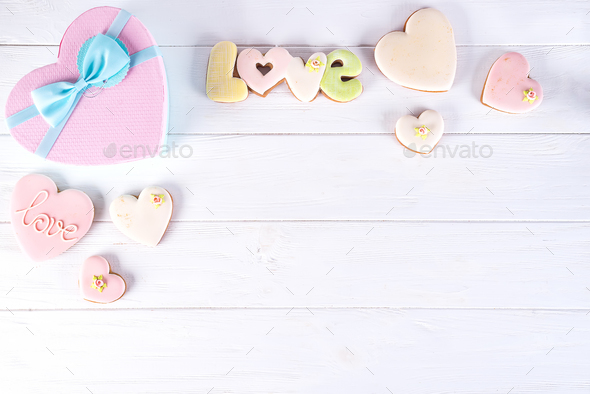 Valentines Day Gift Boxes With Heart Shaped Cookies And Decorations On White Wooden Background