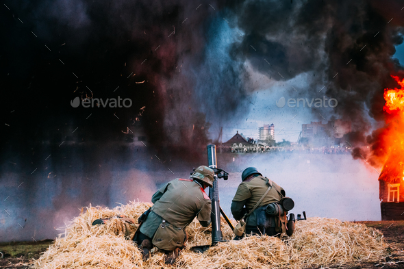 Re-enactors Dressed As World War II German Soldiers Fired From A - Stock Photo - Images