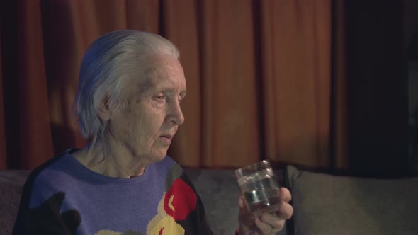 Grandma drinks water