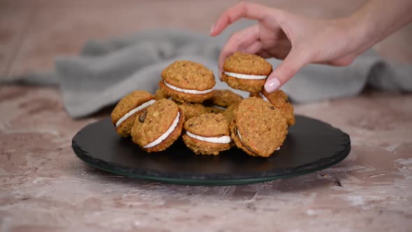Carrot Cake Sandwich Cookies With Cream Cheese Filling.	