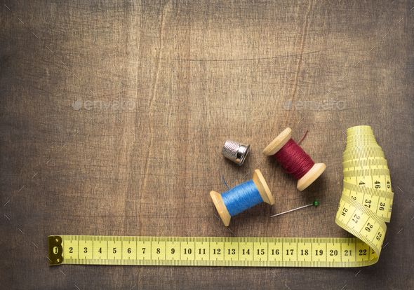 tailor or sewing accessories and supplies with tools at wooden table Stock  Photo by seregam