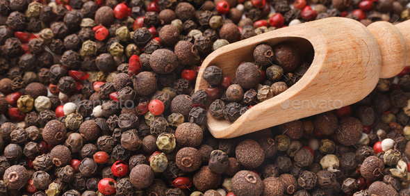 Various spices in wooden spoons on black background Stock Photo by  Prostock-studio