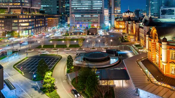 time lapse of night scene of Tokyo Station in the Marunouchi business district, Tokyo, Japan alt