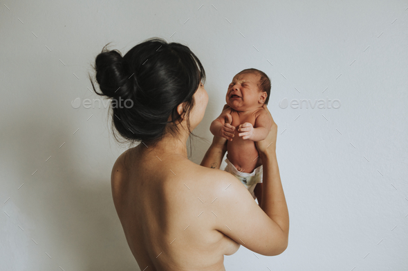 Naked mother holding her infant baby Stock Photo by Rawpixel | PhotoDune