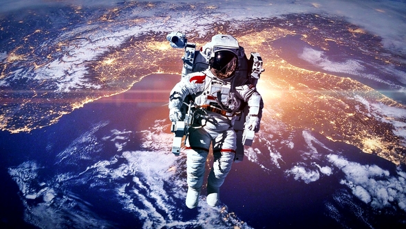 Astronaut Above The Earth