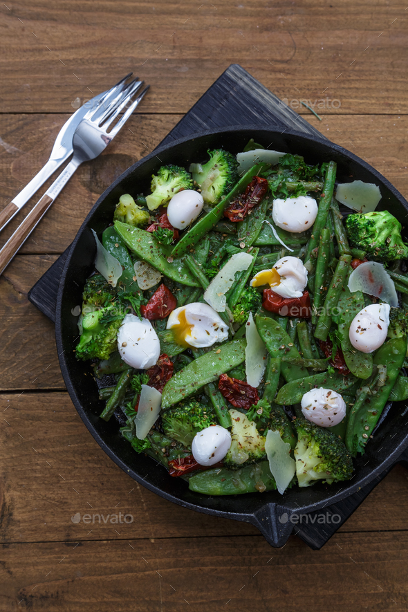 Green Vegetable stir fry. Healthy food. Top view Stock Photo by kopachinsky