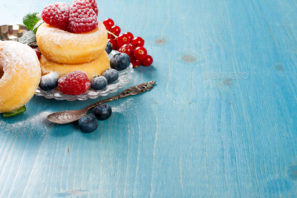 Morning breakfast with mini donuts and berries - Stock Photo - Images