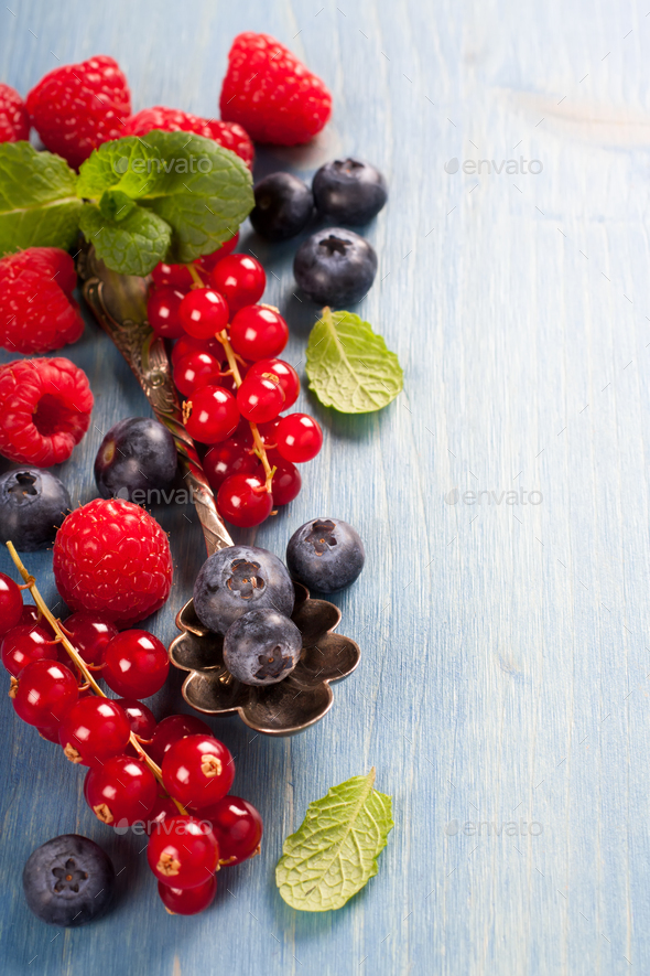 Berries mix with mint - Stock Photo - Images