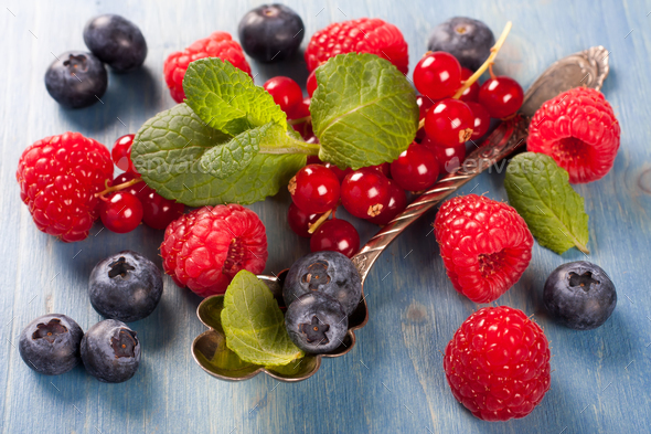 Berries mix with mint - Stock Photo - Images