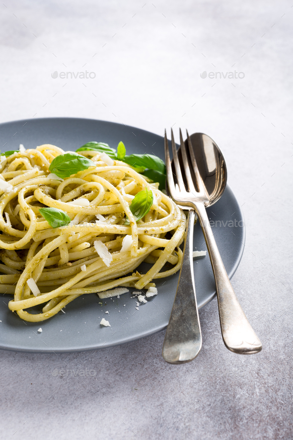 Linguine with green pesto Stock Photo by Merinka PhotoDune