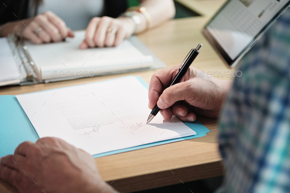 Manager Working As Banking Broker With Old Man Signing Contract - Stock Photo - Images