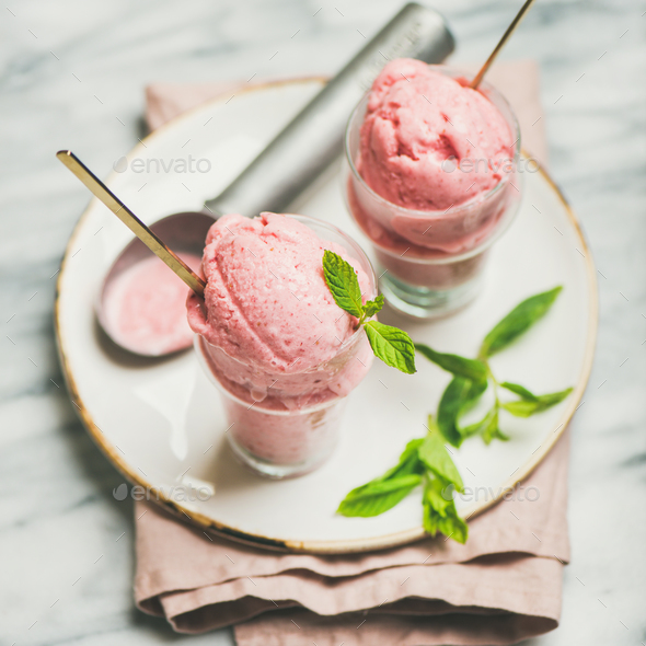 Homemade strawberry yogurt ice cream with fresh mint, square crop - Stock Photo - Images