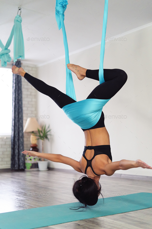 Aerial yoga icons. Illustrations depict a woman performing anti gravity yoga  exercise in different poses and positions with a hammock. The techniques  Stock Vector Image & Art - Alamy