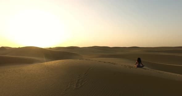 Girl Doing Yoga in the Desert