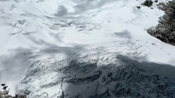 Melting glaciers in the Andes of Peru are causing flooding and environmental issues; caused by globa alt