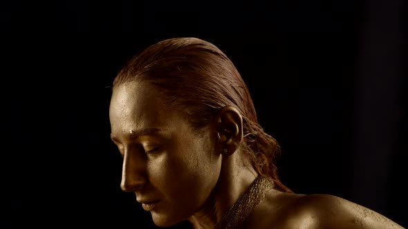 Sexy Excited Woman with Gold on Face and Body Portrait of Amazing Ancient Mysterious Goddess alt