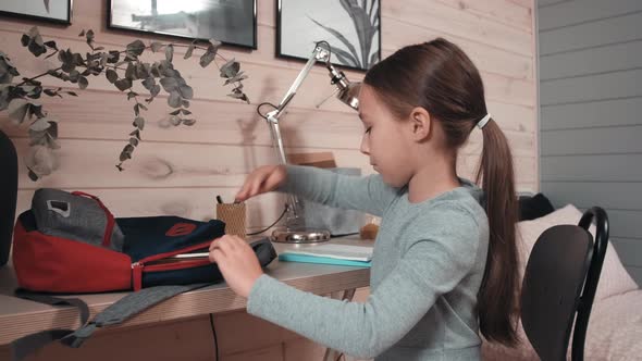 Cute Girl Packing Schoolbag alt