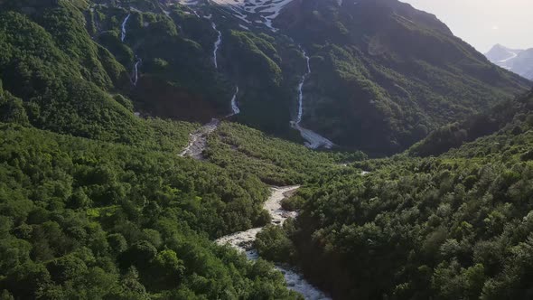 Taimazi Waterfalls Flowing Down From the Slope of Taimazi Mountain alt