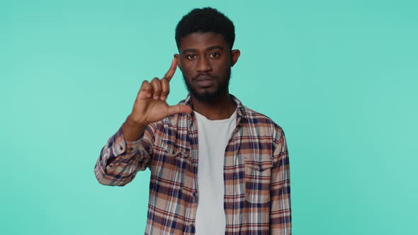 Man Showing Loser Gesture and Pointing on you Blaming Accusing for Unsuccess Bullying Abuse alt