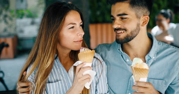 Happy Couple Having Date and Eating Ice Cream