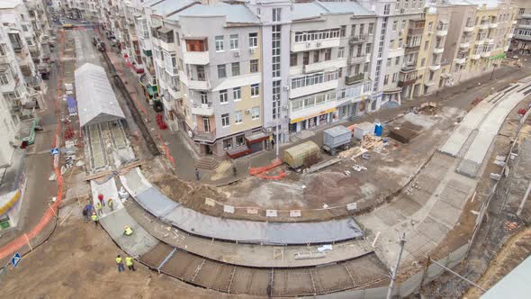 Concrete Works for Road Maintenance Construction with Many Workers and Mixer Timelapse alt