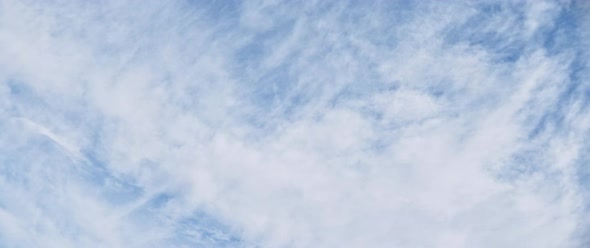 Light wind blowing clouds on the sky alt