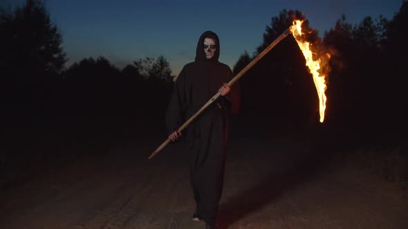 Grim Reaper with Burning Scythe Walking at Night by ...