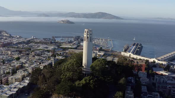 Aerial, San Francisco Coit Tower and cityscape, panning right drone 01. alt